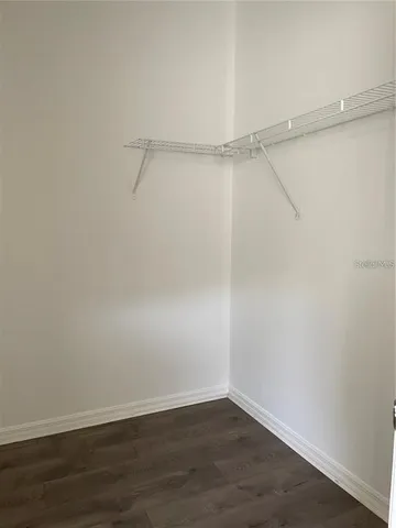 a view of an empty walk in closet