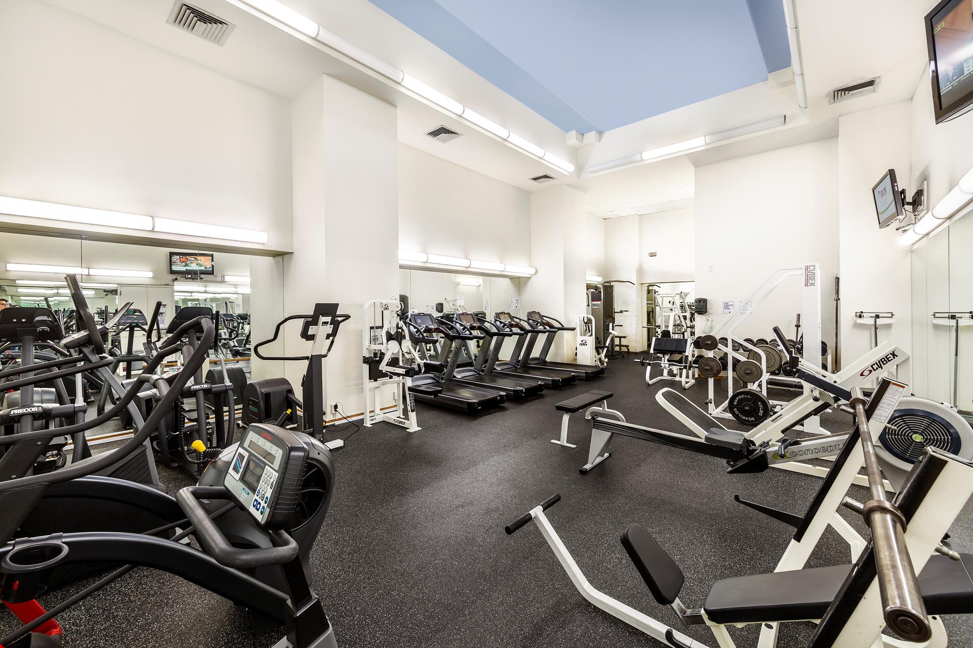 301 West 57th Street, Unit 38B Manhattan, NY 10019 - Photo 13 of 17 a view of a room with gym equipment