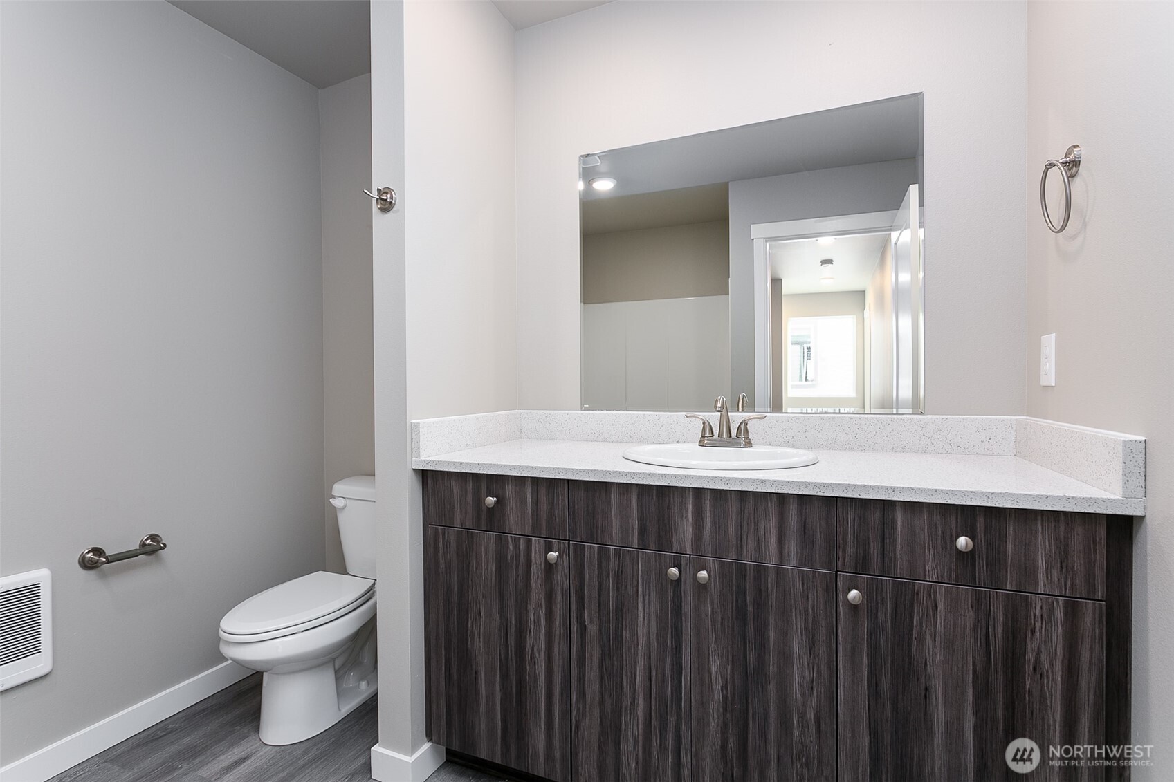 1817 Eastgate Loop Ferndale, WA 98248 - Photo 16 of 32 a bathroom with a sink vanity mirror and toilet