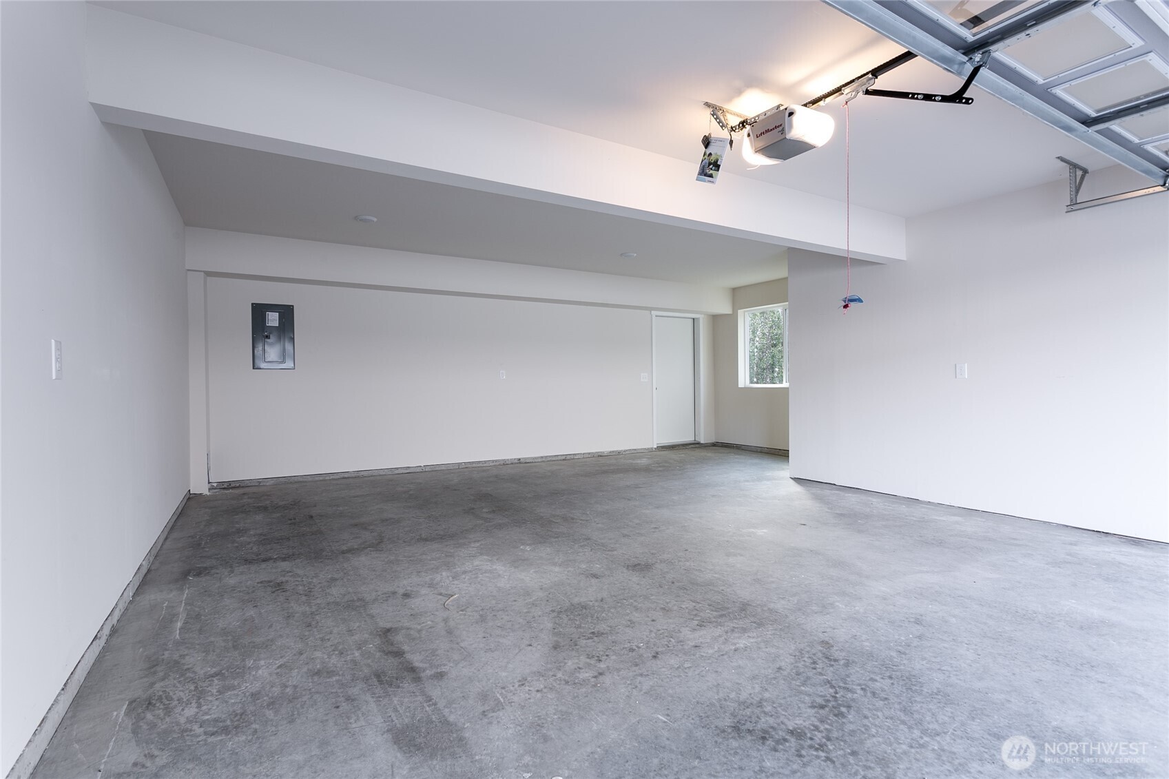 1817 Eastgate Loop Ferndale, WA 98248 - Photo 19 of 32 a view of a hallway with a chandelier fan