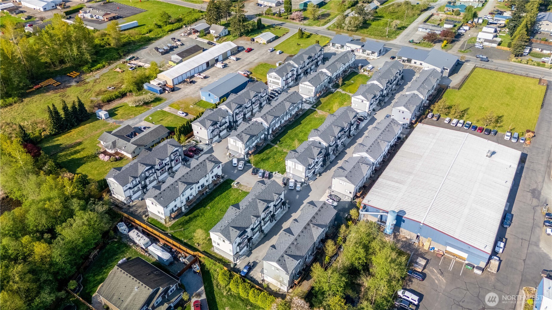 1817 Eastgate Loop Ferndale, WA 98248 - Photo 23 of 32 an aerial view of a house with a yard and swimming pool