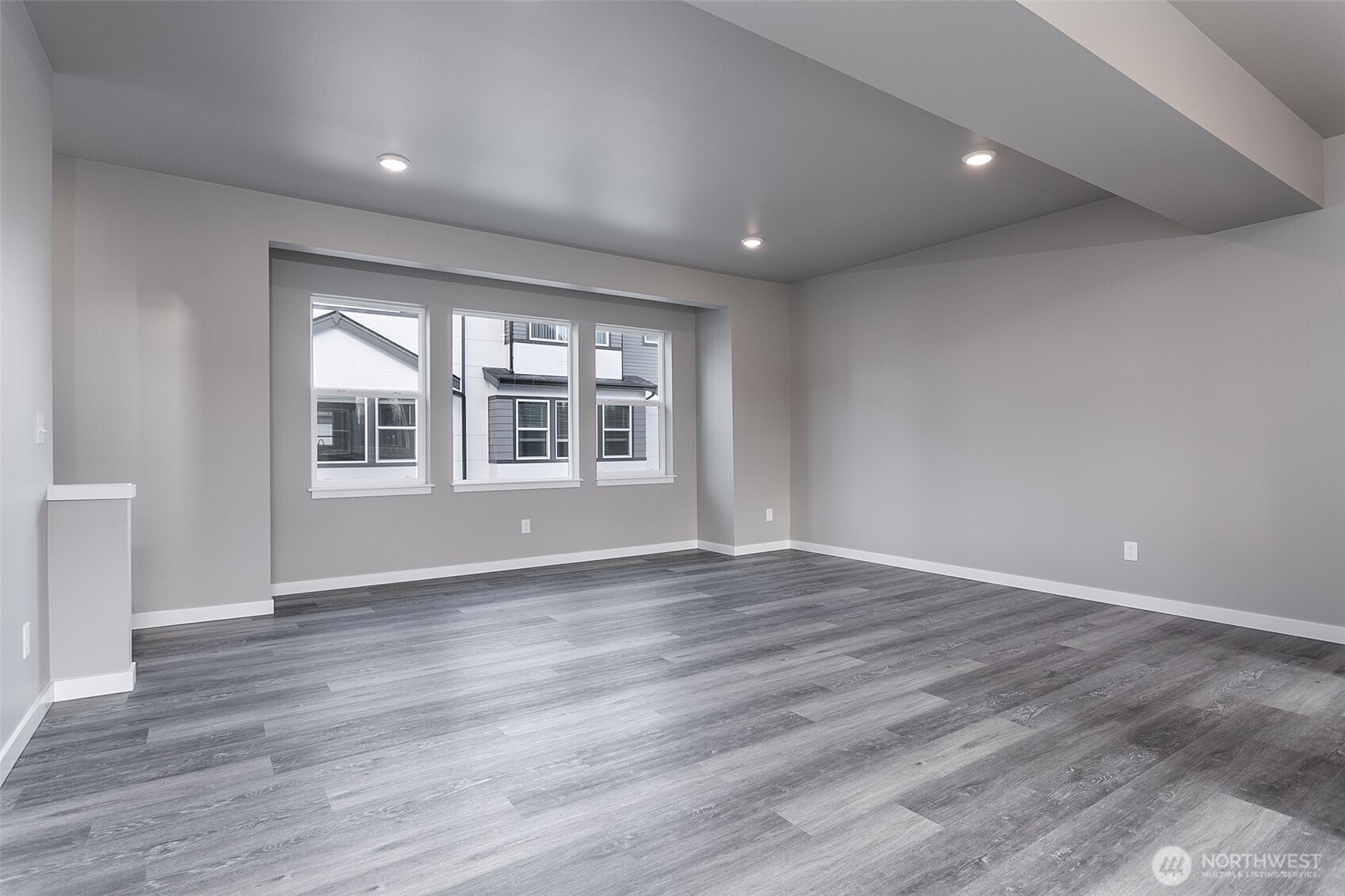 1817 Eastgate Loop Ferndale, WA 98248 - Photo 8 of 32 a view of empty room with wooden floor and fan