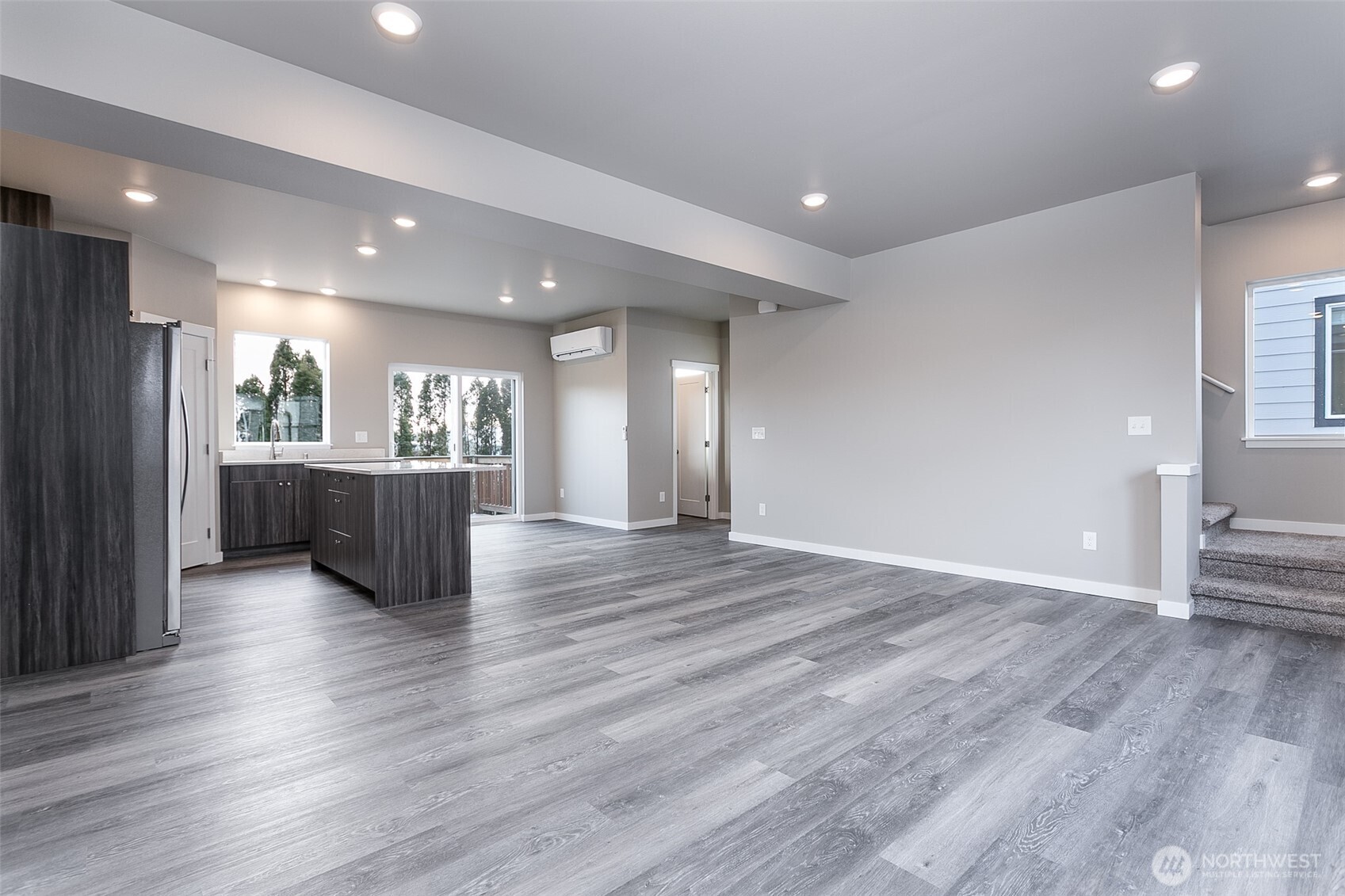 1817 Eastgate Loop Ferndale, WA 98248 - Photo 9 of 32 a view of a kitchen with a sink and a refrigerator