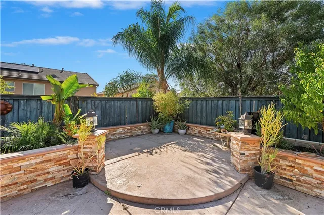 a view of a chair with wooden fence