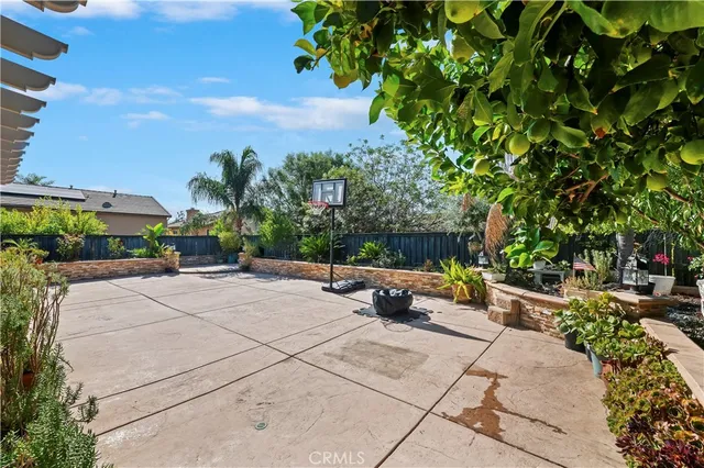 a view of a garden with sitting area