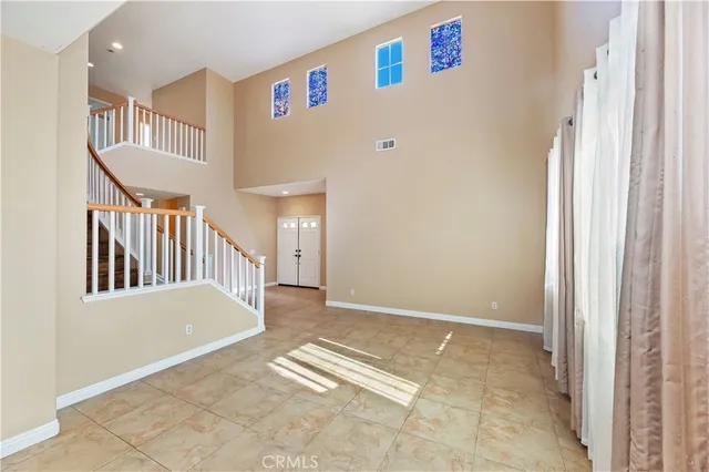 a view of livingroom with furniture and stairs