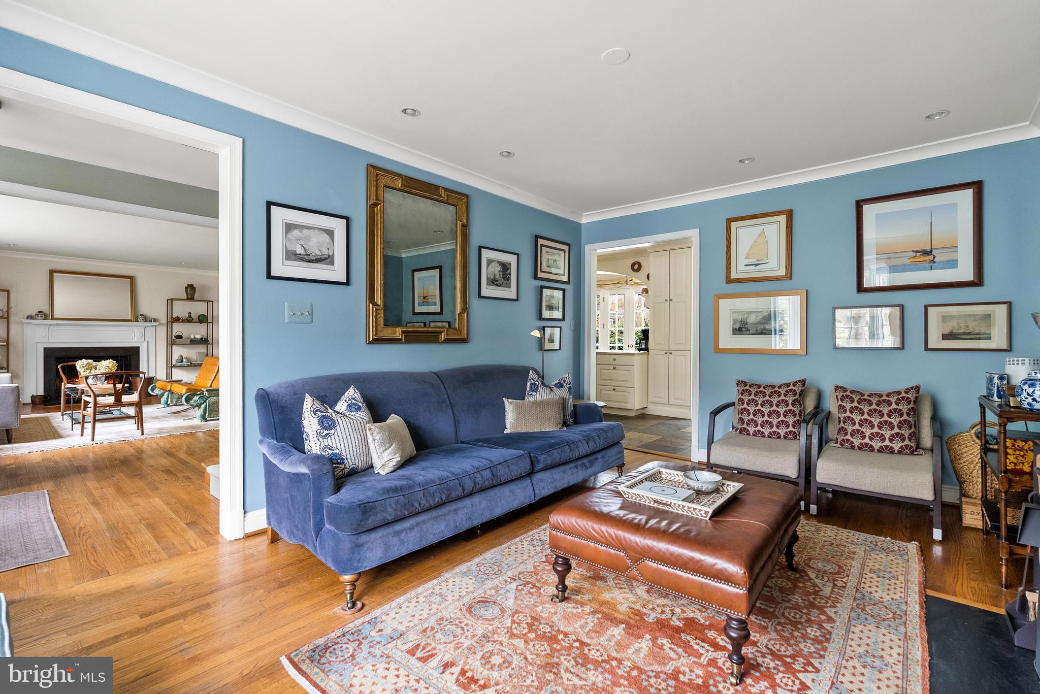 5202 Portsmouth Road Bethesda, MD 20816 - Photo 19 of 43 a living room with furniture and painting on the wall