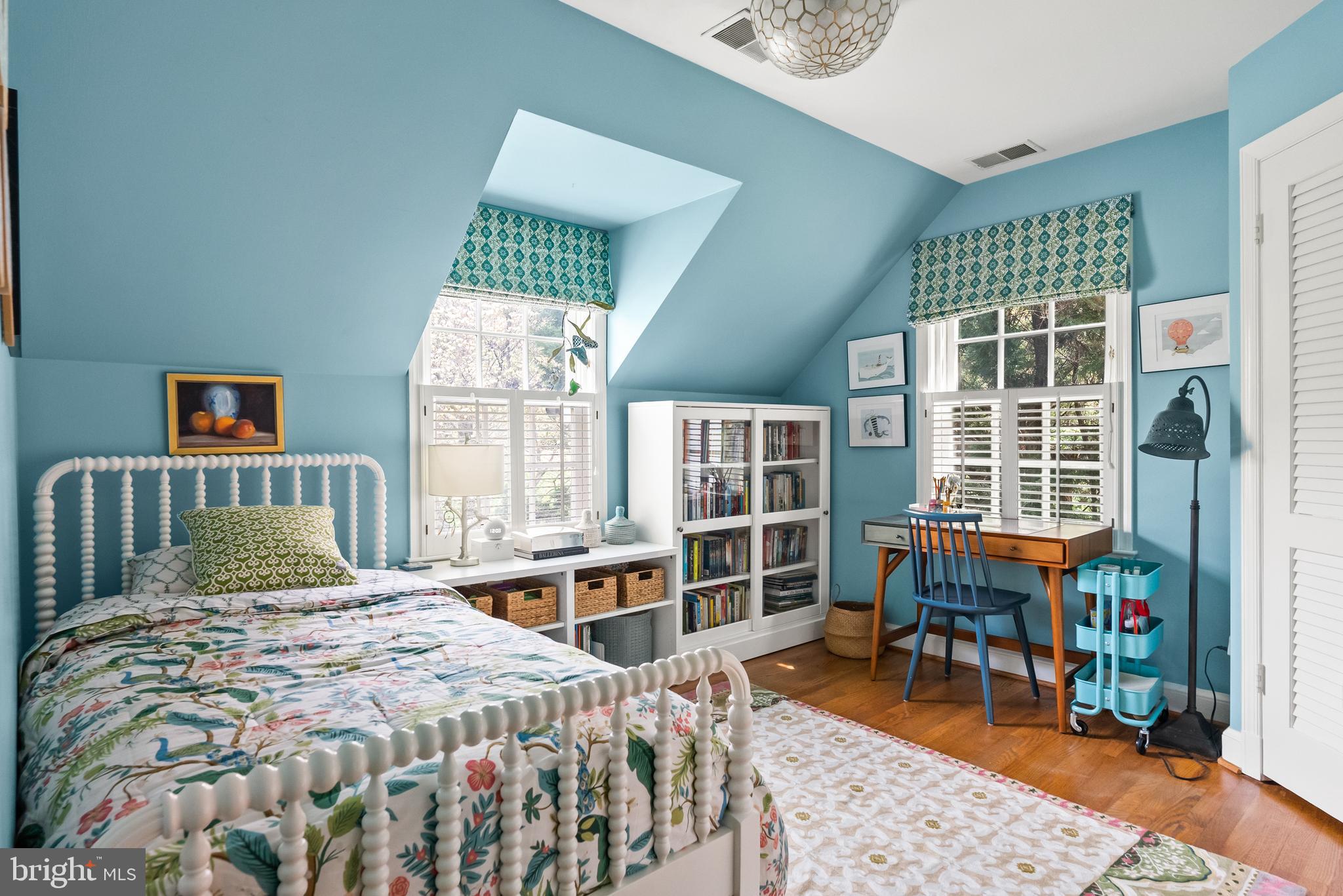 5202 Portsmouth Road Bethesda, MD 20816 - Photo 27 of 43 a bedroom with a bed and a window