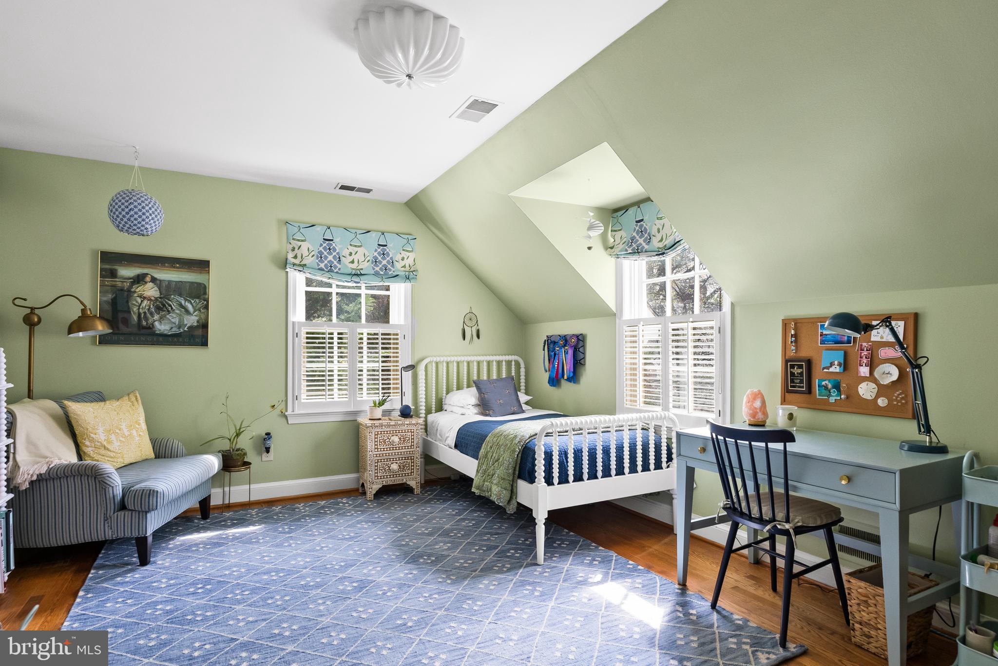 5202 Portsmouth Road Bethesda, MD 20816 - Photo 28 of 43 a bedroom with furniture and a window