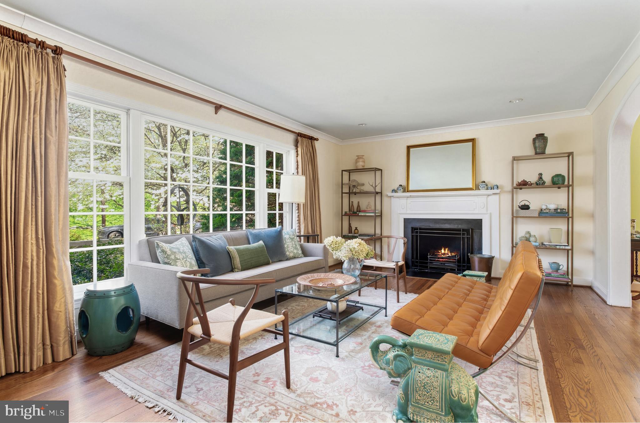 5202 Portsmouth Road Bethesda, MD 20816 - Photo 3 of 43 a living room with furniture and a fireplace
