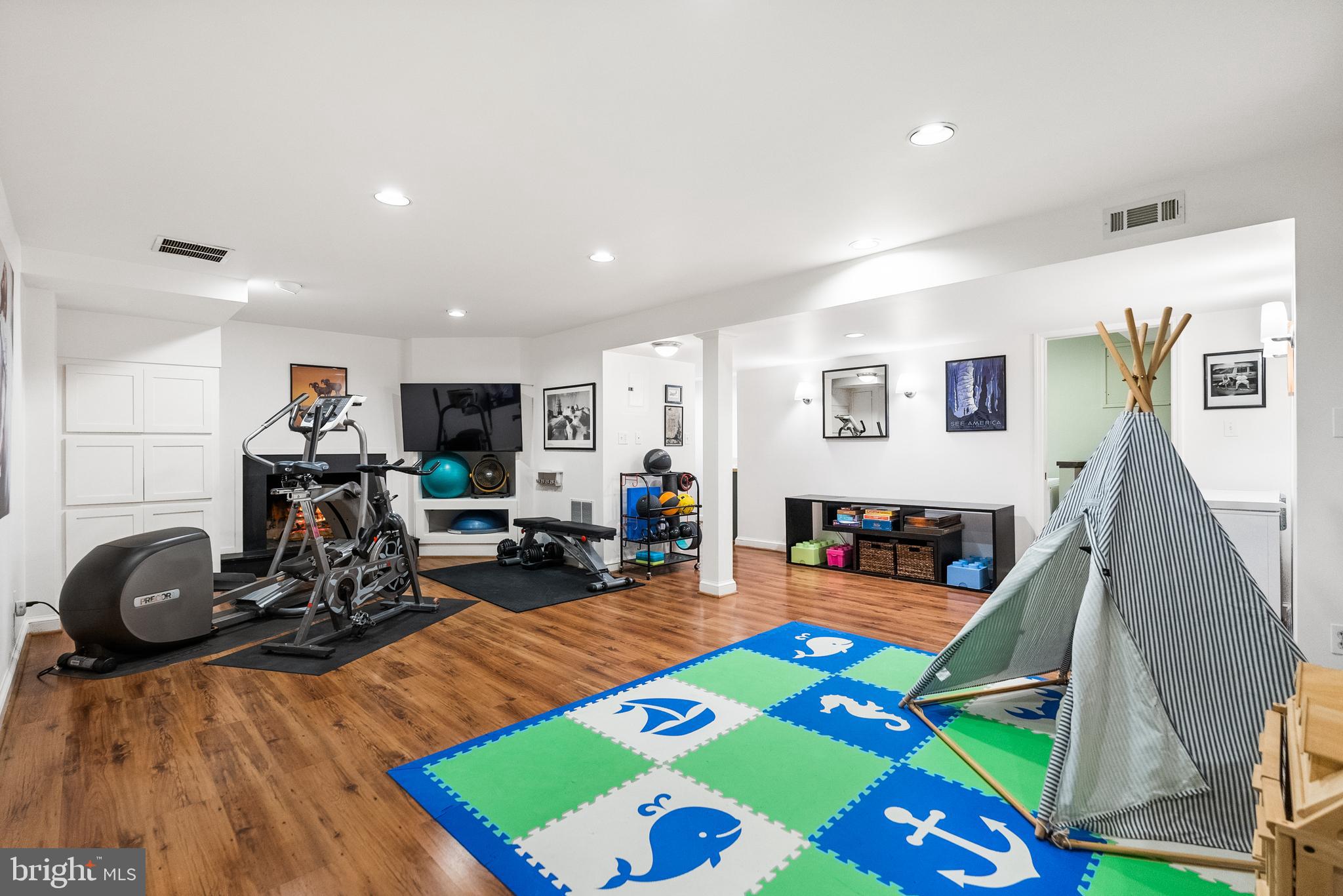 5202 Portsmouth Road Bethesda, MD 20816 - Photo 31 of 43 a room with furniture and a wooden floor