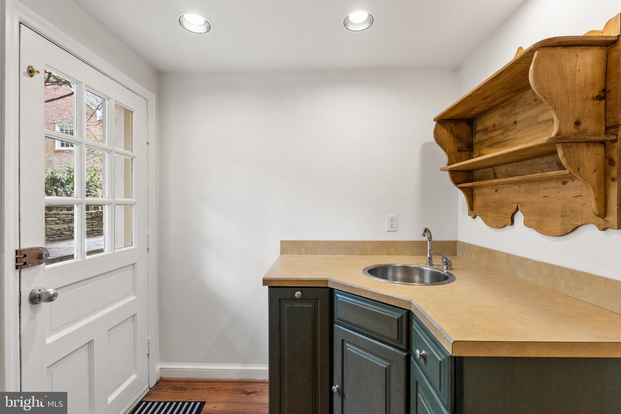5202 Portsmouth Road Bethesda, MD 20816 - Photo 32 of 43 a bathroom with a sink and a mirror