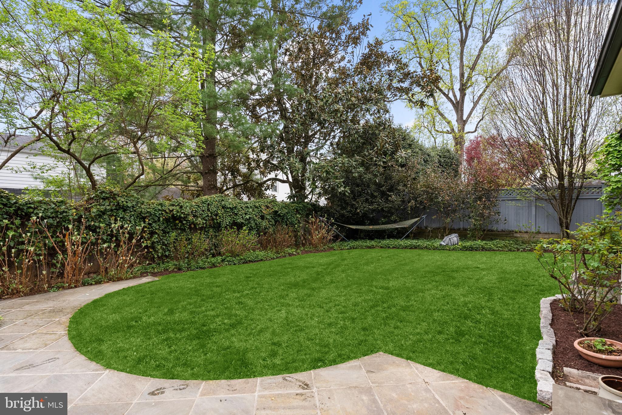5202 Portsmouth Road Bethesda, MD 20816 - Photo 36 of 43 a view of a backyard with a garden