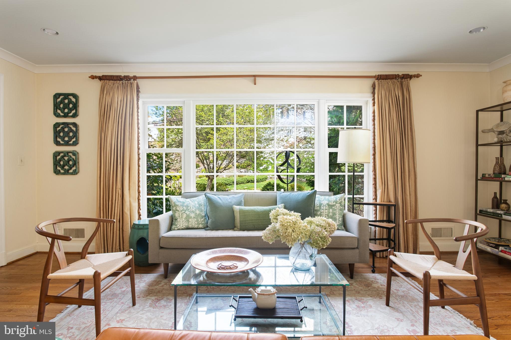 5202 Portsmouth Road Bethesda, MD 20816 - Photo 4 of 43 a living room with furniture and a large window