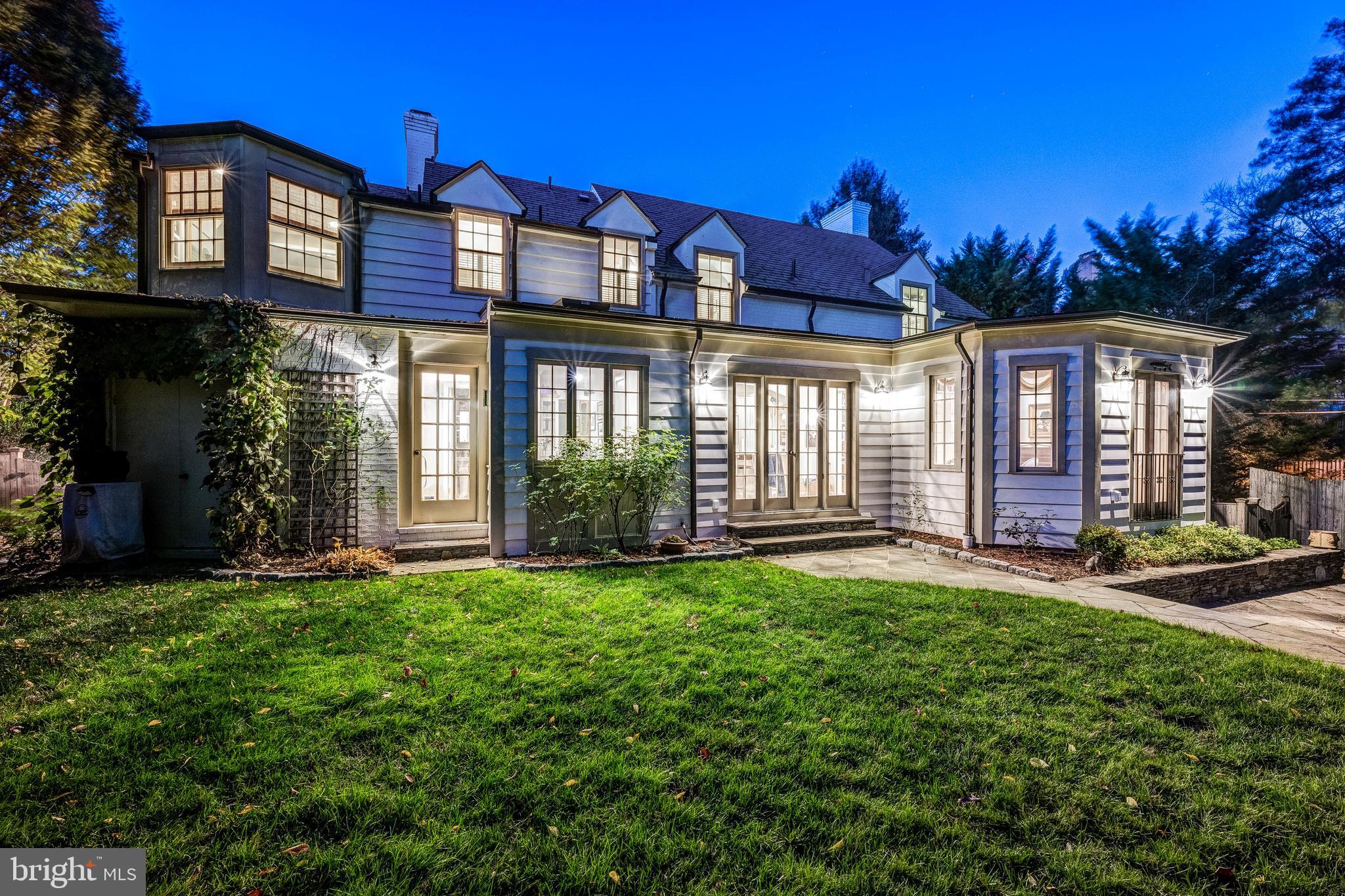 5202 Portsmouth Road Bethesda, MD 20816 - Photo 41 of 43 a front view of a house with a yard