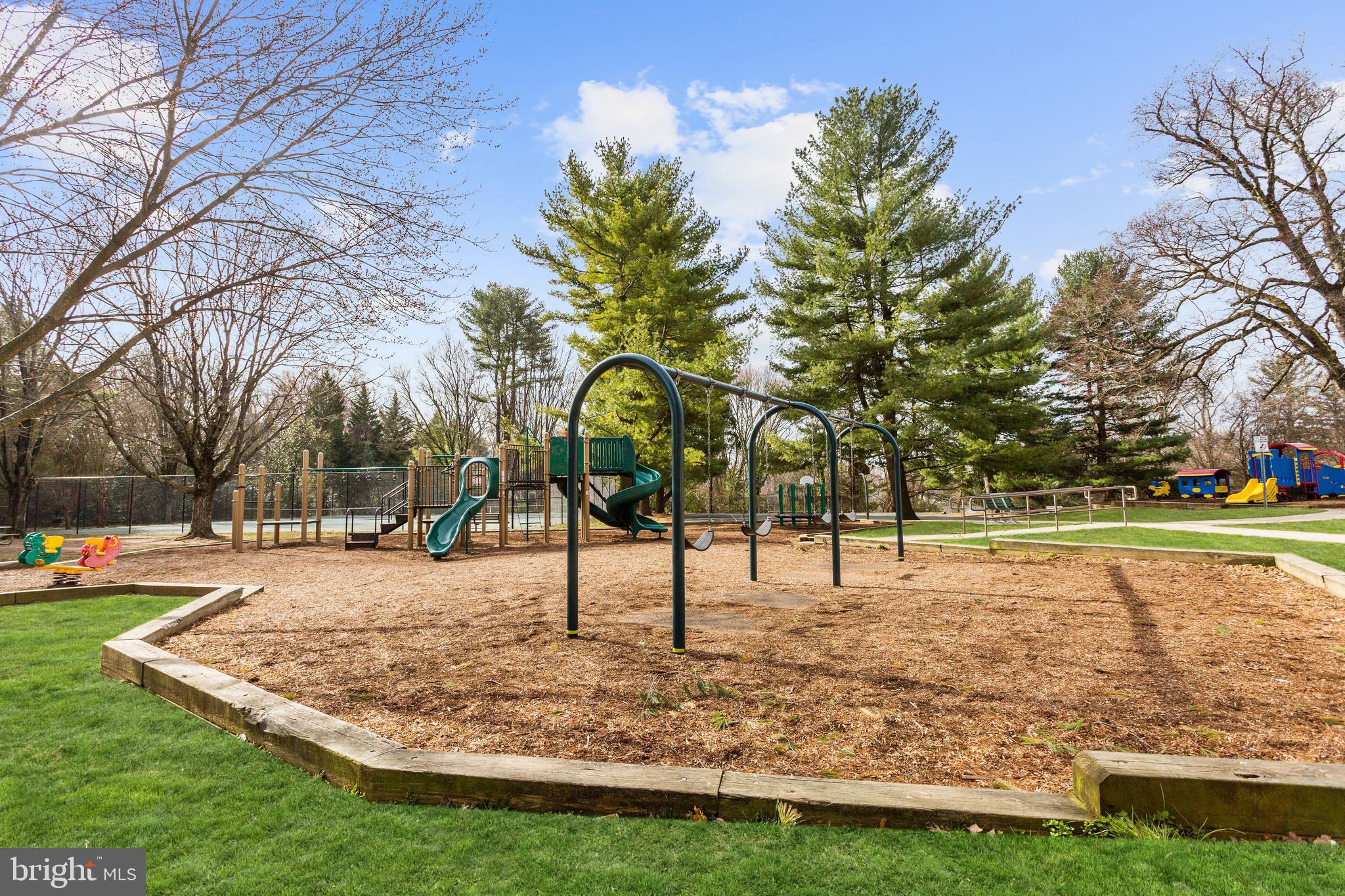 5202 Portsmouth Road Bethesda, MD 20816 - Photo 42 of 43 a view of yard with swimming pool and trees
