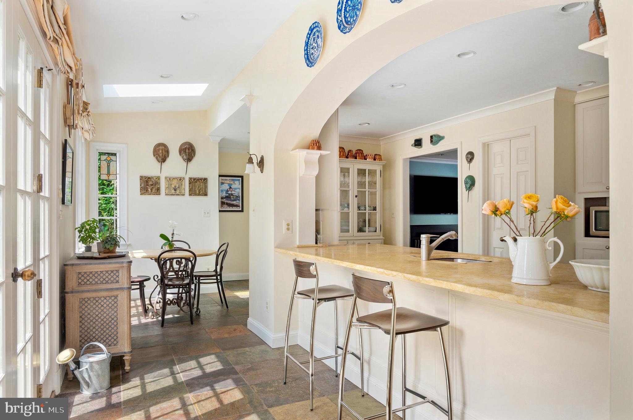 5202 Portsmouth Road Bethesda, MD 20816 - Photo 7 of 43 a living room with furniture and flat screen tv