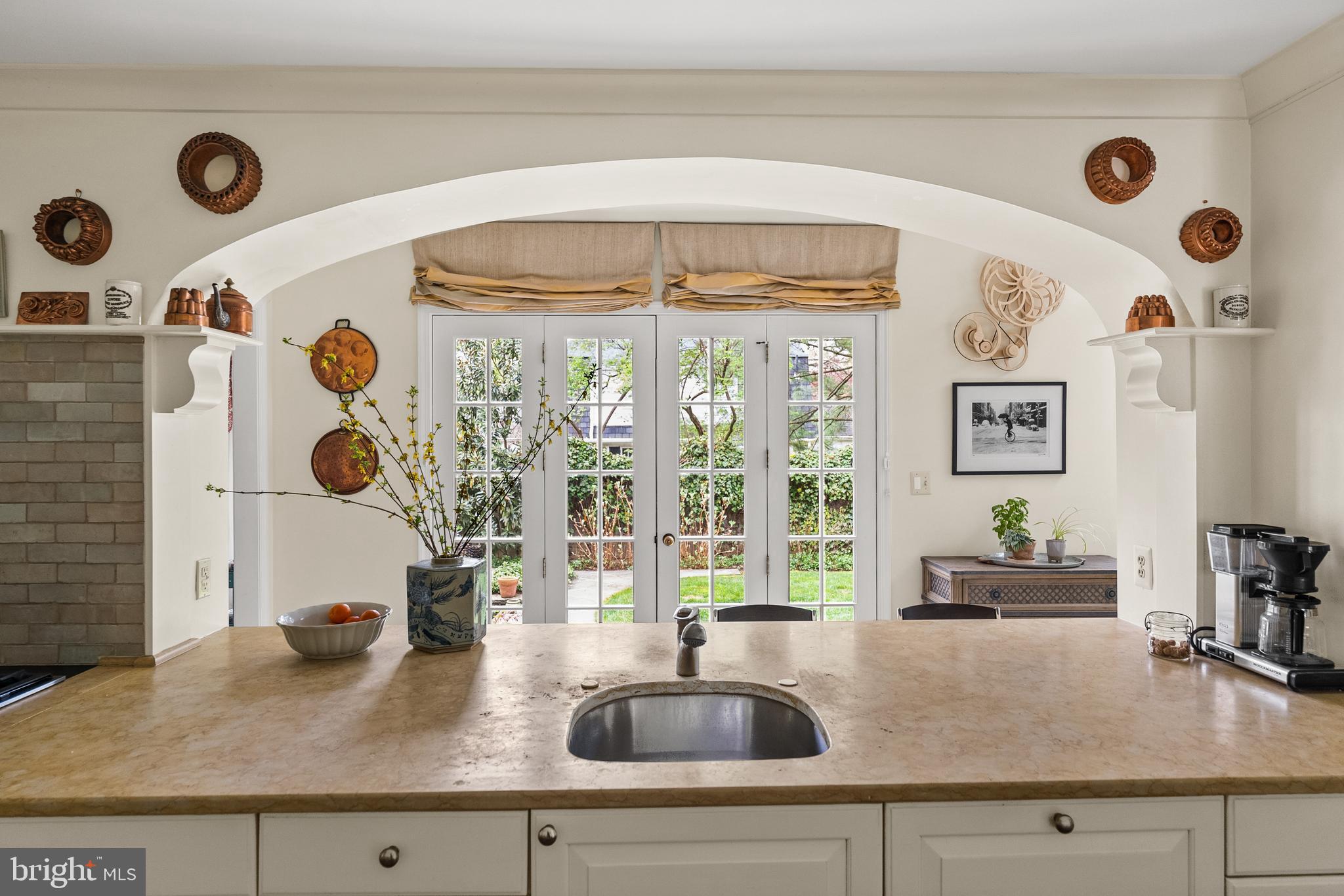 5202 Portsmouth Road Bethesda, MD 20816 - Photo 9 of 43 a kitchen with a sink and large window