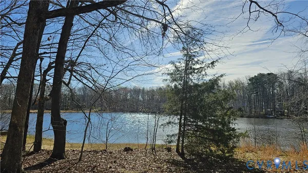 a view of a yard covered with snow