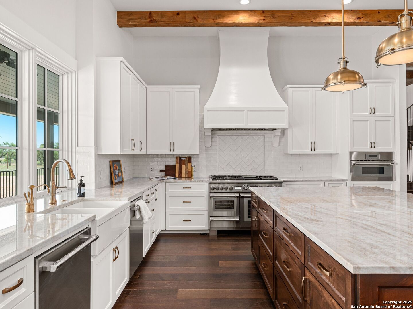 862 Grape Creek Road Fredericksburg, TX 78624 - Photo 23 of 90 a kitchen with stainless steel appliances a sink stove and cabinets