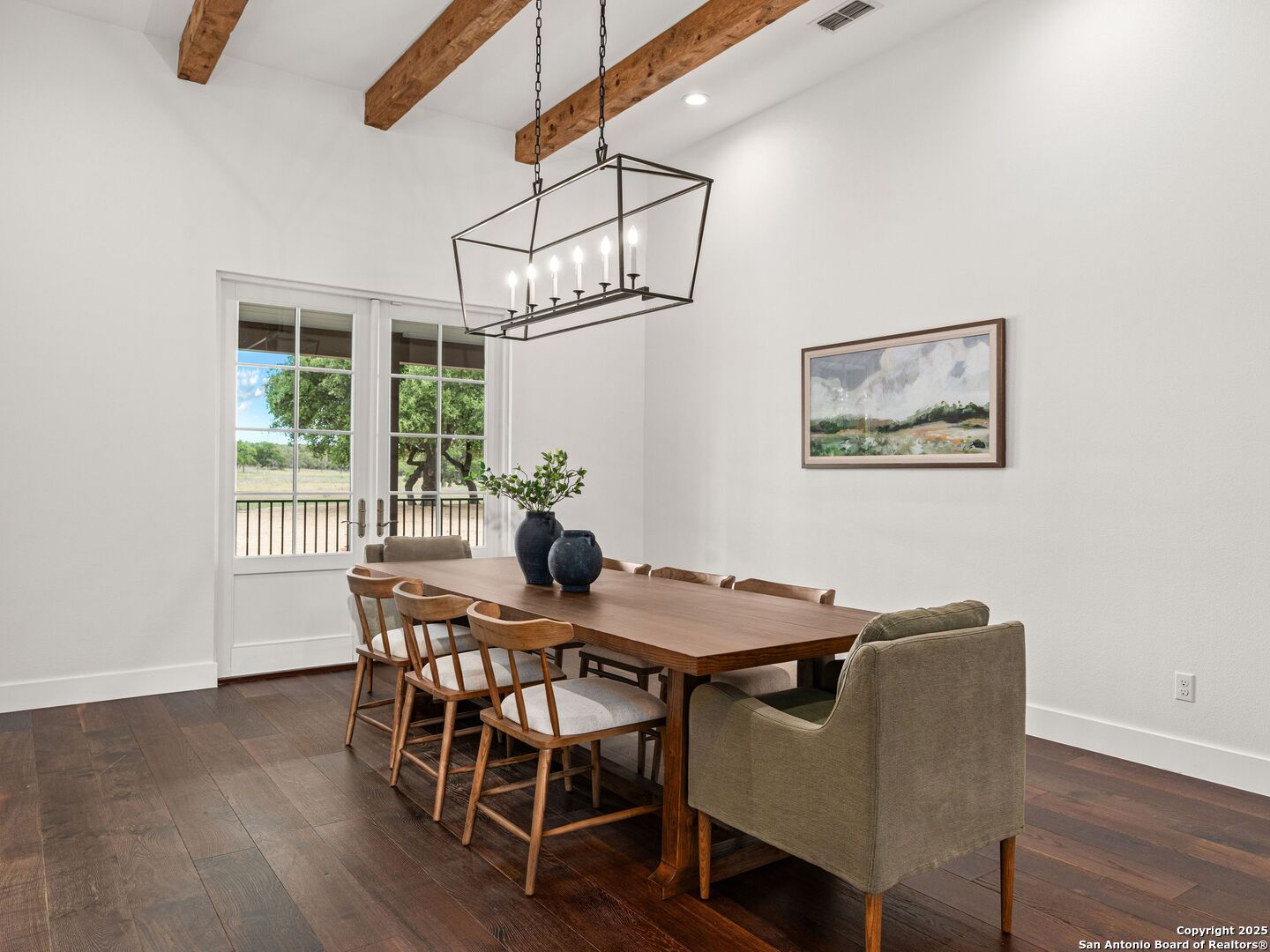862 Grape Creek Road Fredericksburg, TX 78624 - Photo 26 of 90 a view of a dining room with furniture window and wooden floor