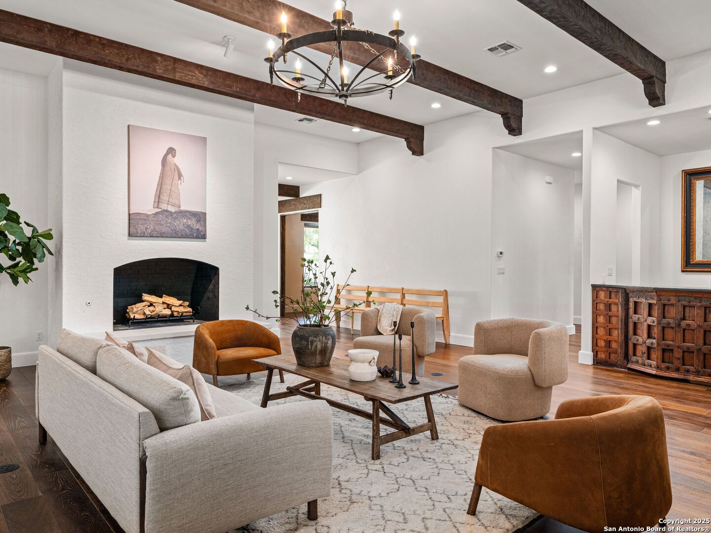 862 Grape Creek Road Fredericksburg, TX 78624 - Photo 54 of 90 a living room with furniture and a fireplace