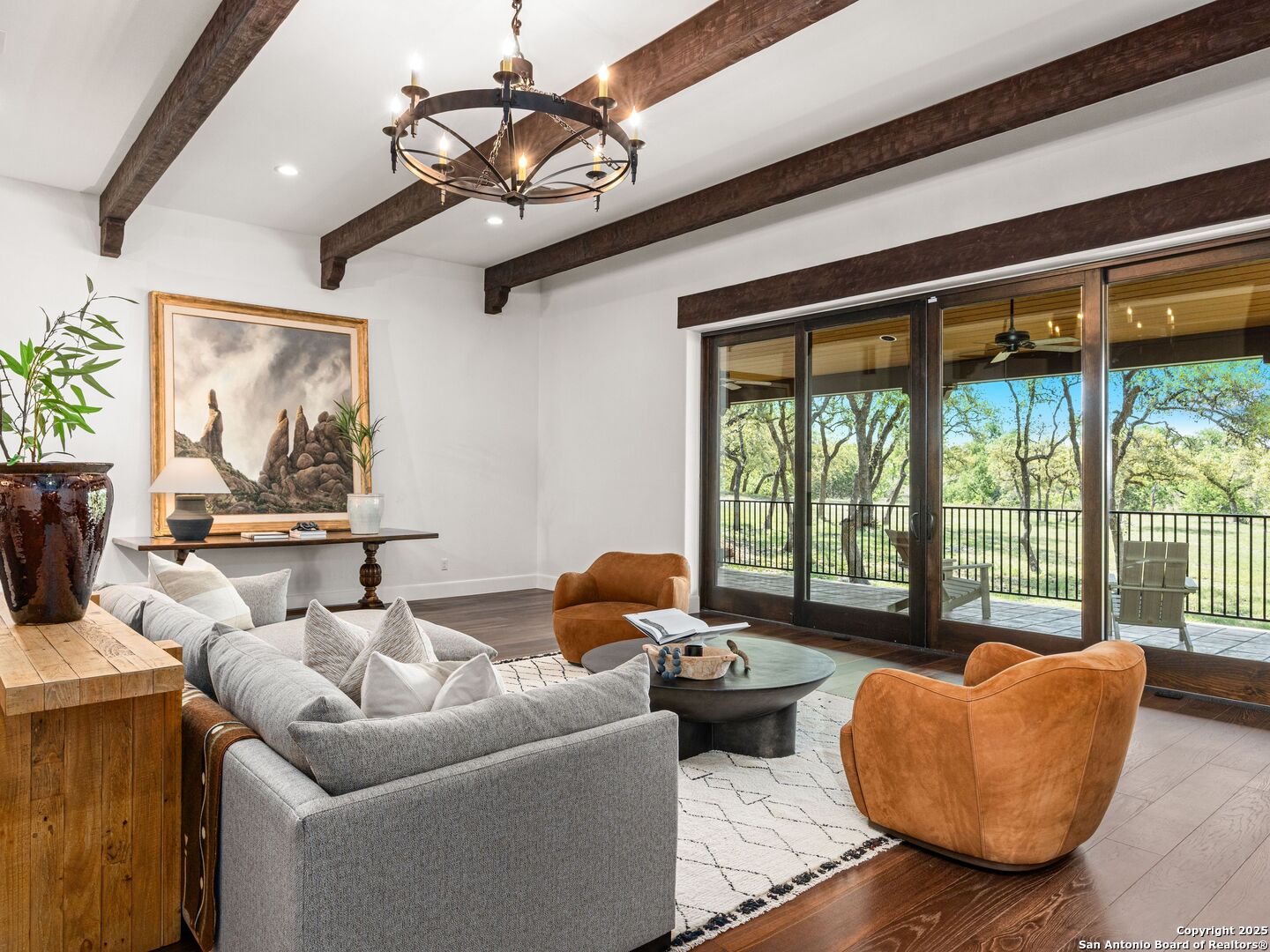862 Grape Creek Road Fredericksburg, TX 78624 - Photo 55 of 90 a living room with furniture and a floor to ceiling window