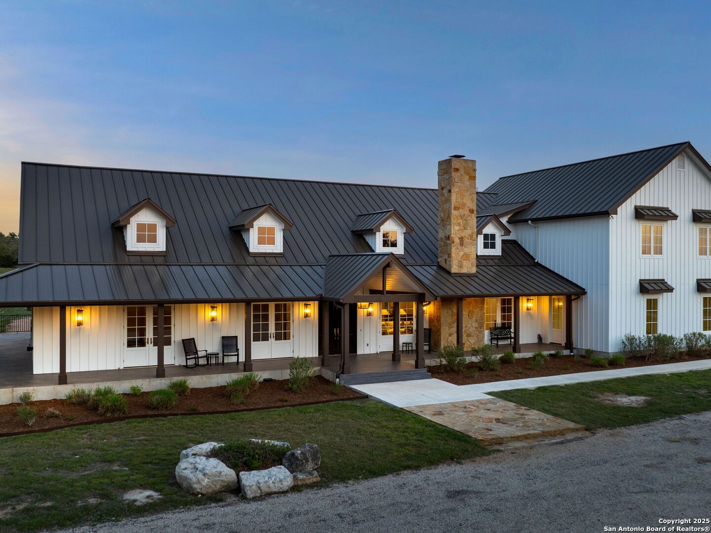 862 Grape Creek Road Fredericksburg, TX 78624 - Photo 8 of 90 a front view of a house with garden