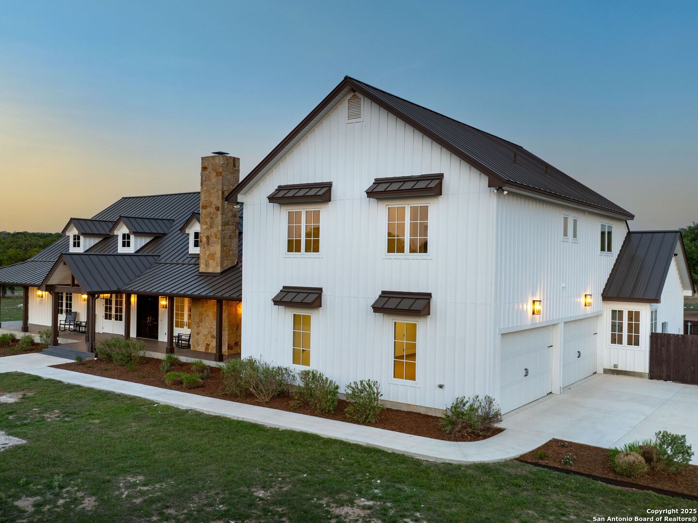 862 Grape Creek Road Fredericksburg, TX 78624 - Photo 9 of 90 a front view of a house with a yard