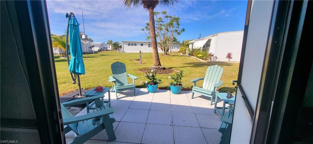 21 Diamond Lane, Unit D21 Naples, FL 34112 - Photo 5 of 5 wooden floor view