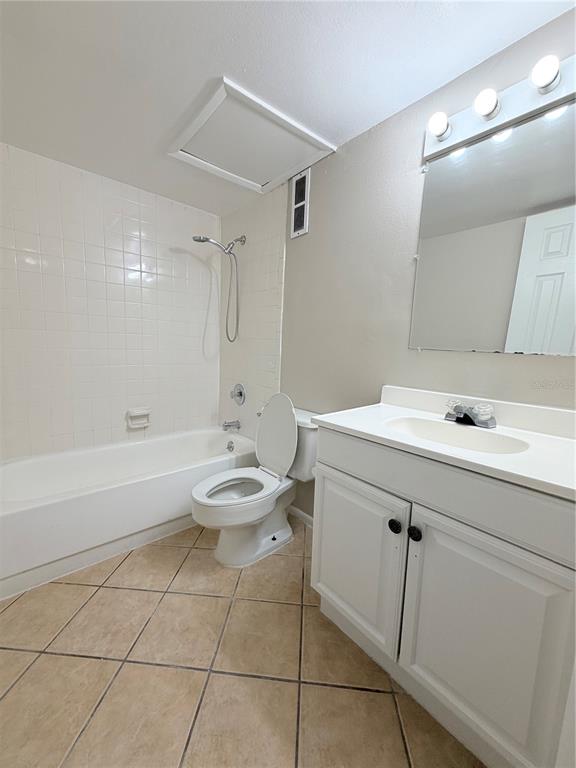 908 Lake Destiny Road, Unit B Altamonte Springs, FL 32714 - Photo 6 of 16 a bathroom with a sink a toilet and shower