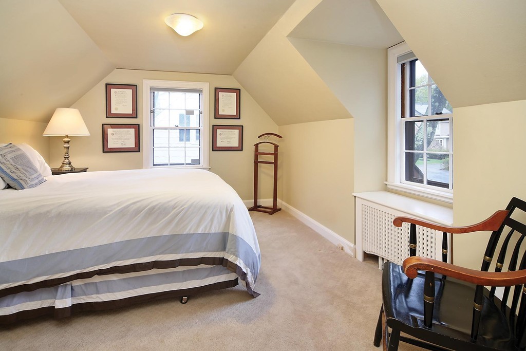 49 Olde Field Road Newton, MA 02459 - Photo 7 of 12 a bedroom with a bed and a window