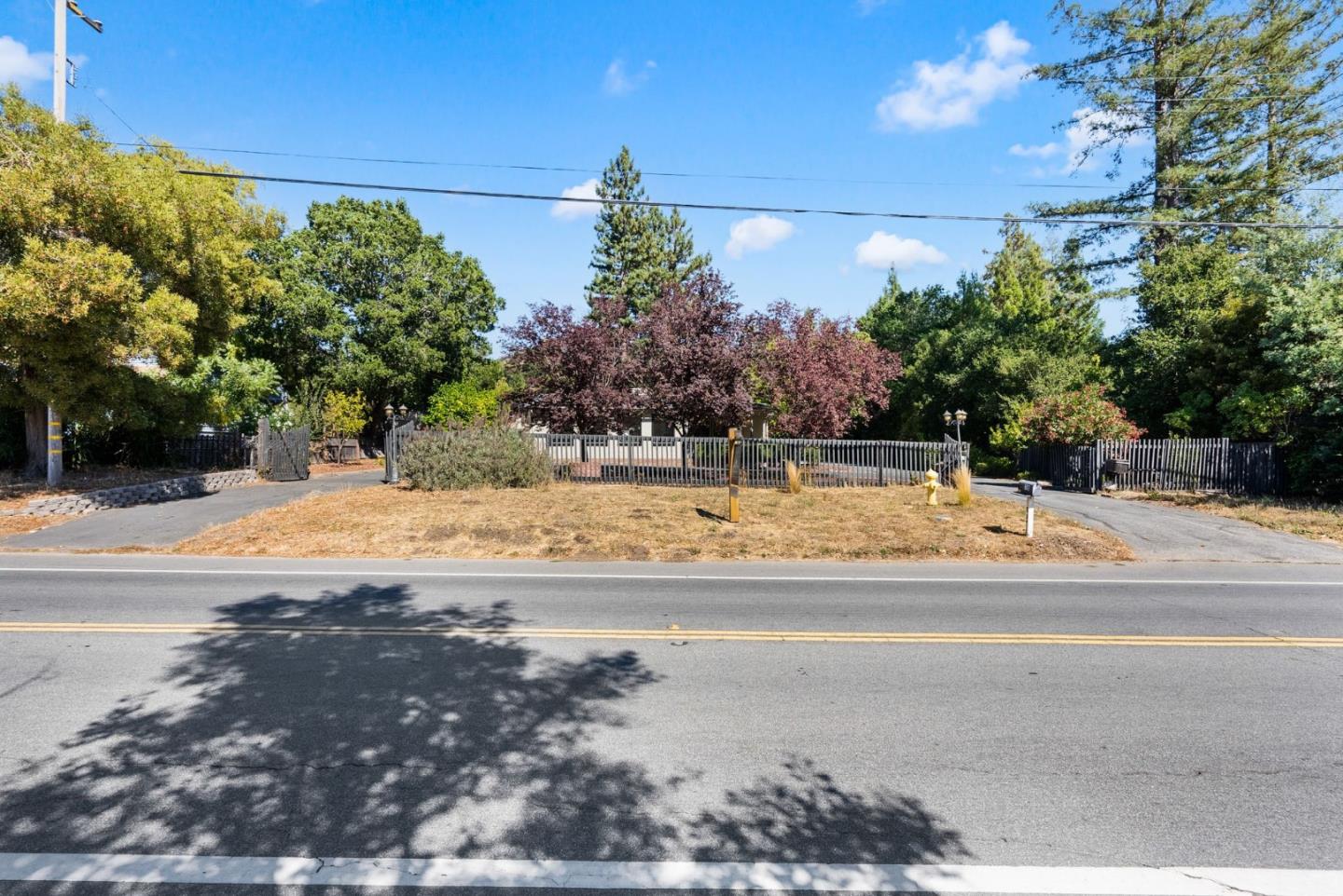 807 Cañada Road Woodside, CA 94062 - Photo 6 of 35 a view of yard with swimming pool and green space