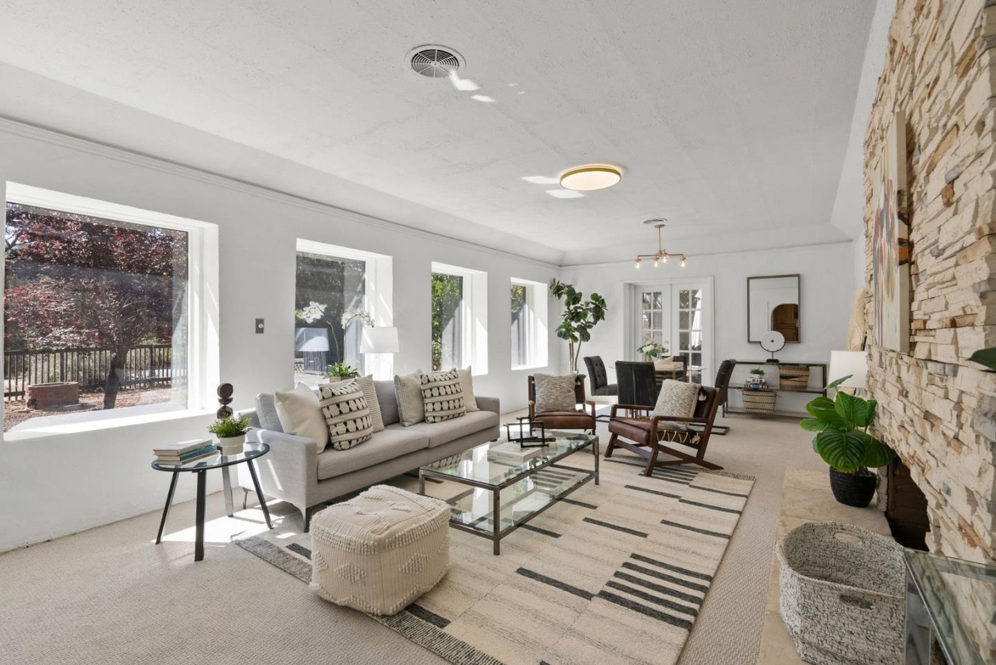 807 Cañada Road Woodside, CA 94062 - Photo 10 of 35 a living room with furniture and a large window