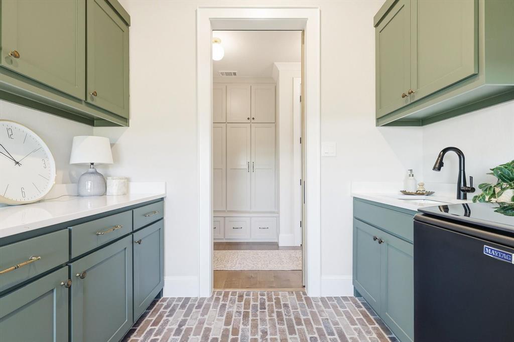 122 Ozro Road Venus, TX 76084 - Photo 37 of 40 Laundry room with closet to left. Beautiful brick floor