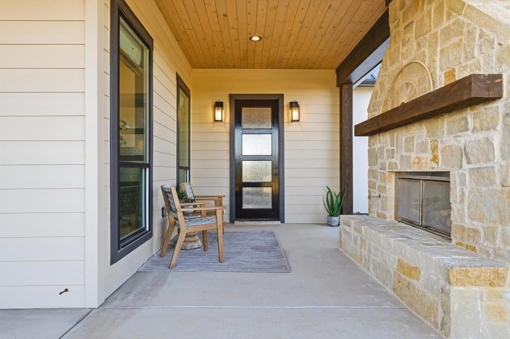 122 Ozro Road Venus, TX 76084 - Photo 5 of 40 Door leads from Coffee bar to outside.