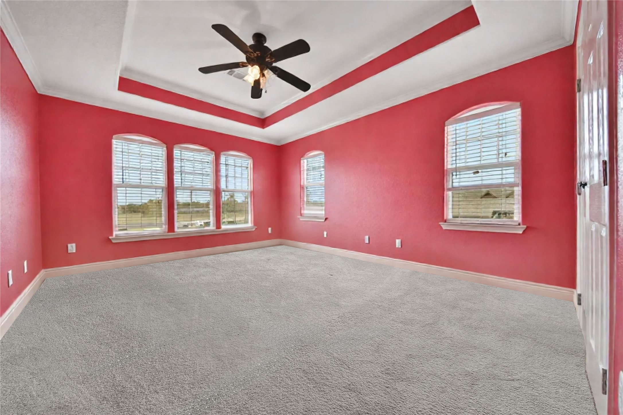 22 O'Bannon Ranch Road Huntsville, TX 77320 - Photo 23 of 31 a big room with windows and fan