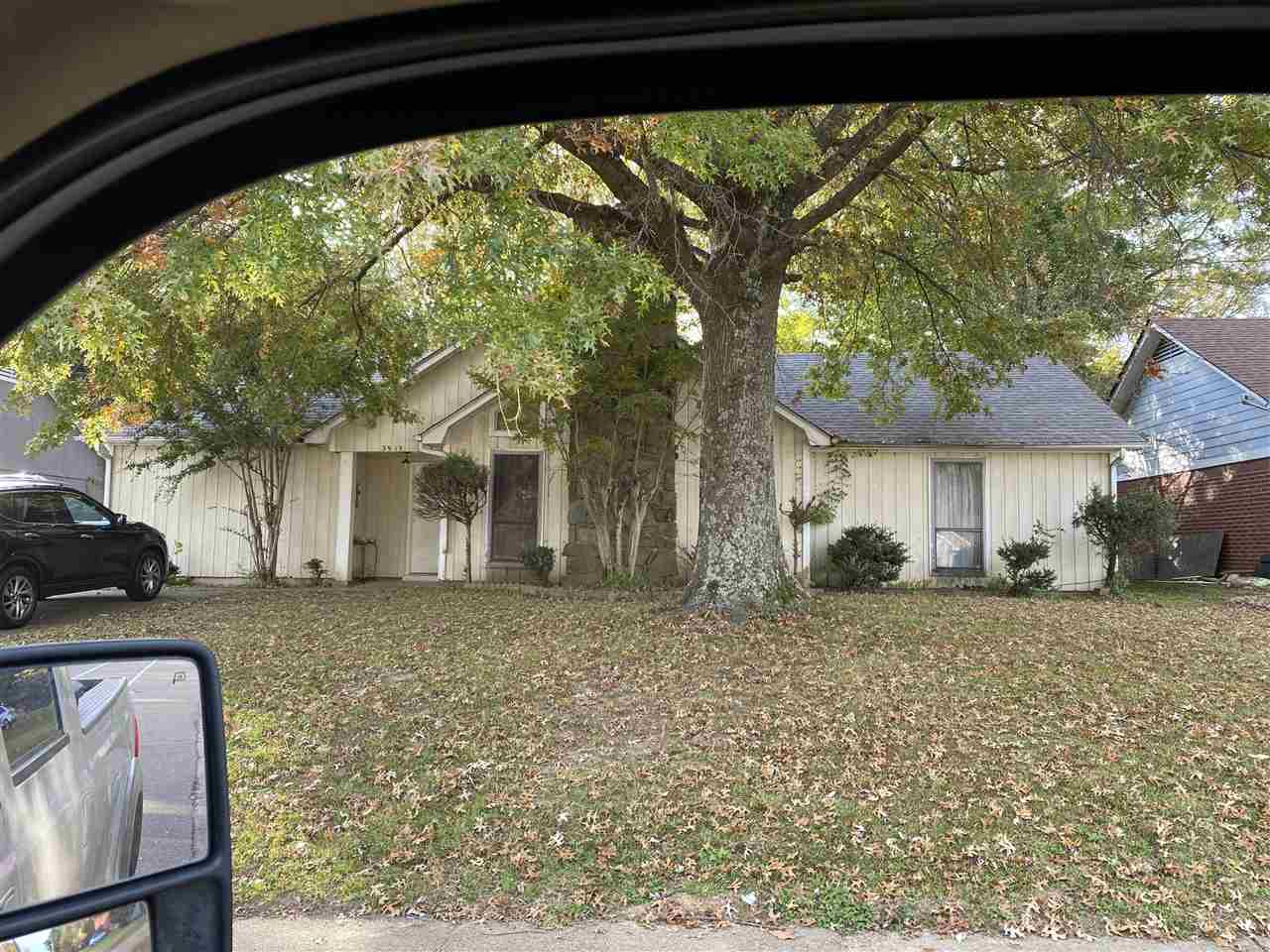 3915 Ross Road Memphis, TN 38115 - Photo 1 of 1 a view of a house with a yard