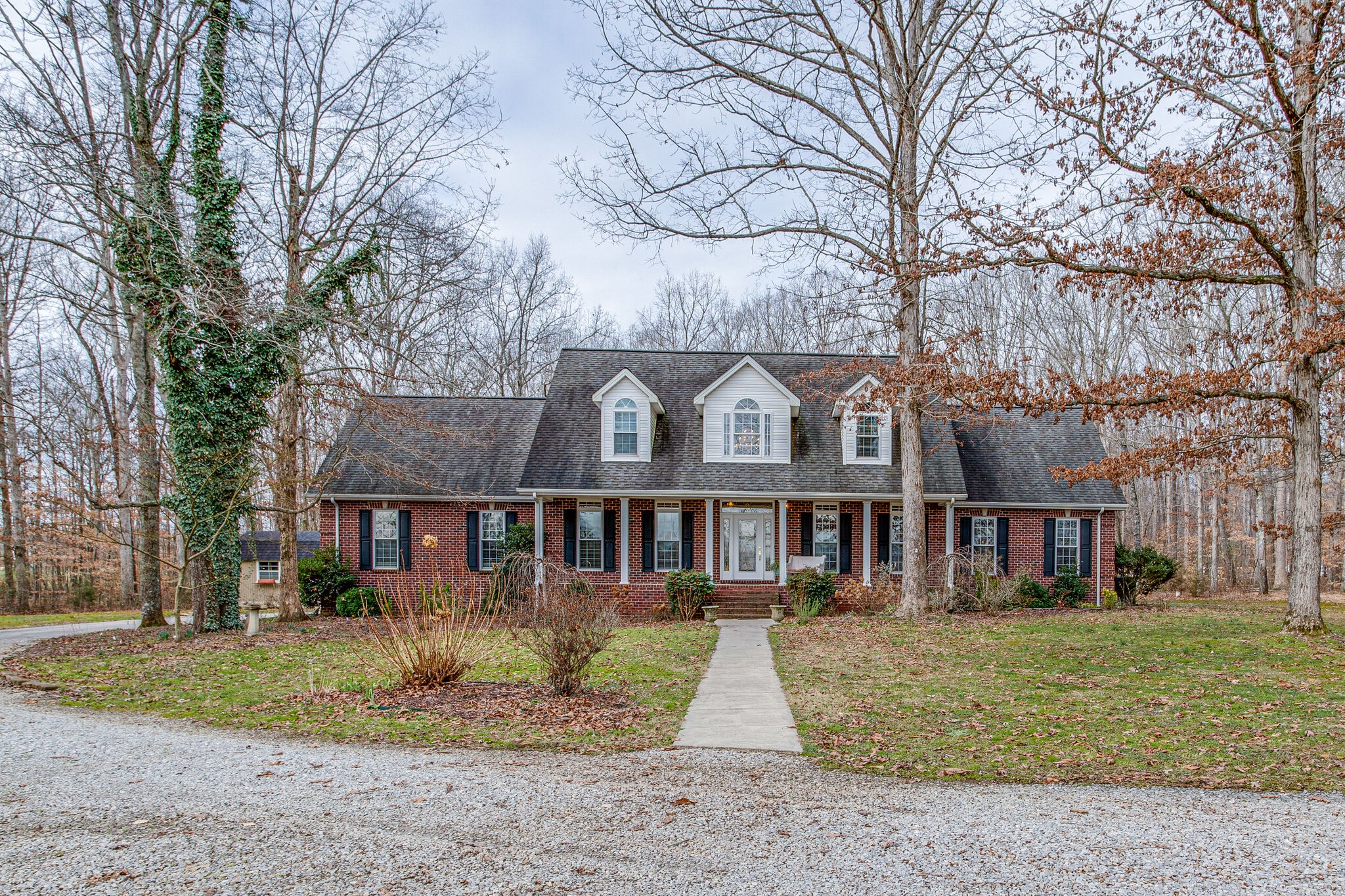 918 Urban Farms Road Manchester, TN 37355 - Photo 2 of 63 a front view of a house with a yard