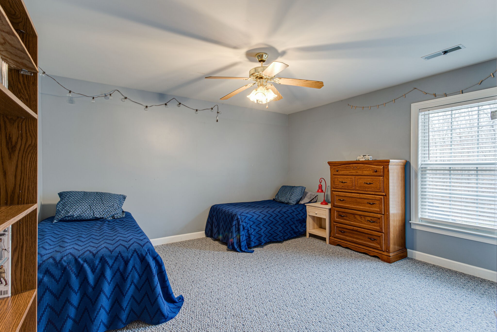 918 Urban Farms Road Manchester, TN 37355 - Photo 31 of 63 a bedroom with furniture and a window
