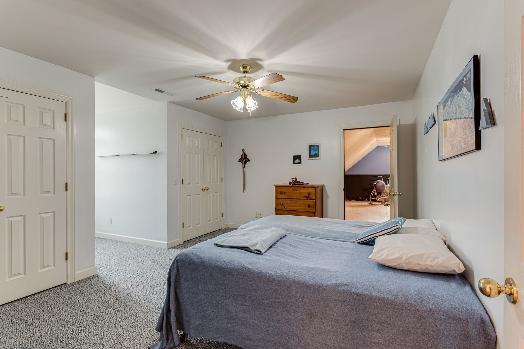 918 Urban Farms Road Manchester, TN 37355 - Photo 32 of 63 a bedroom with a bed and a chandelier