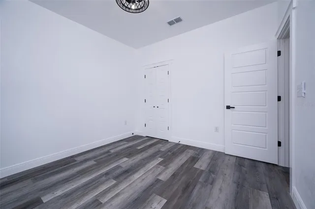 a view of room with hardwood floor