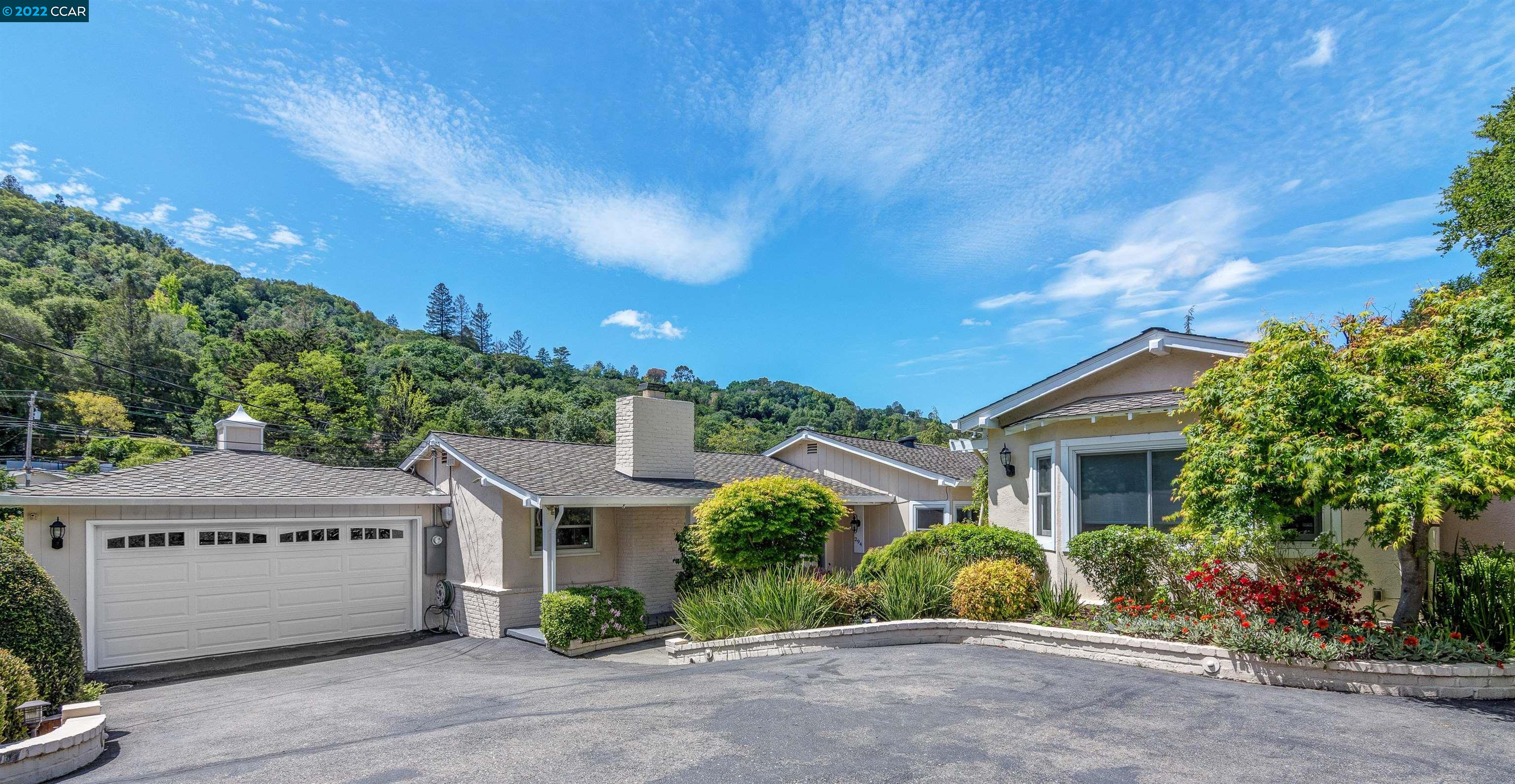 294 Orchard Road Orinda, CA 94563 - Photo 1 of 1 a front view of a house with a yard