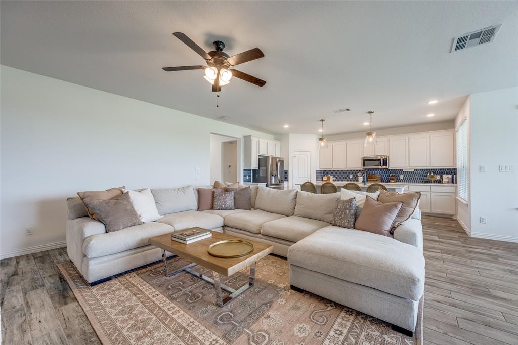 1933 Franklin Road Tom Bean, TX 75090 - Photo 11 of 28 a living room with furniture and wooden floor
