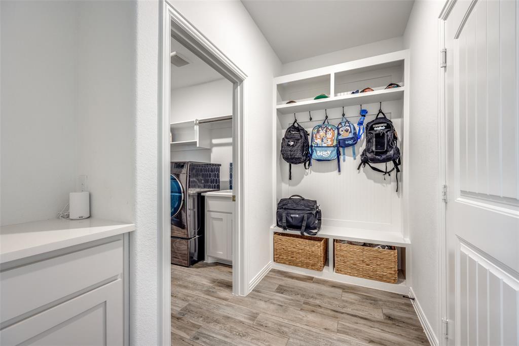 1933 Franklin Road Tom Bean, TX 75090 - Photo 14 of 28 a view of walk in closet with clothes and shoes