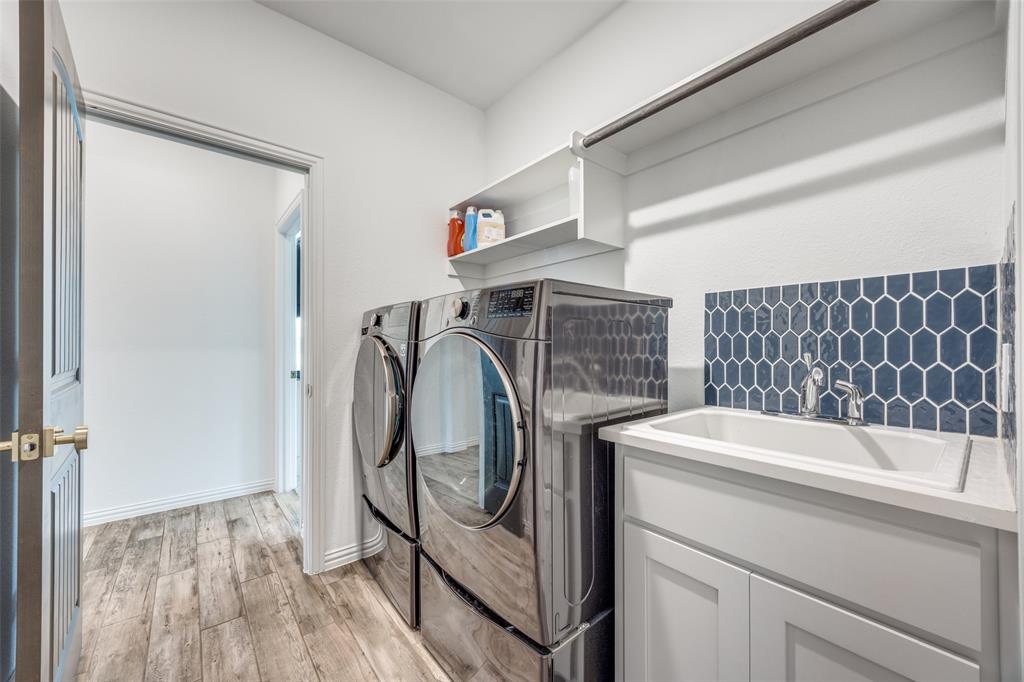 1933 Franklin Road Tom Bean, TX 75090 - Photo 15 of 28 a bathroom with a sink and a mirror