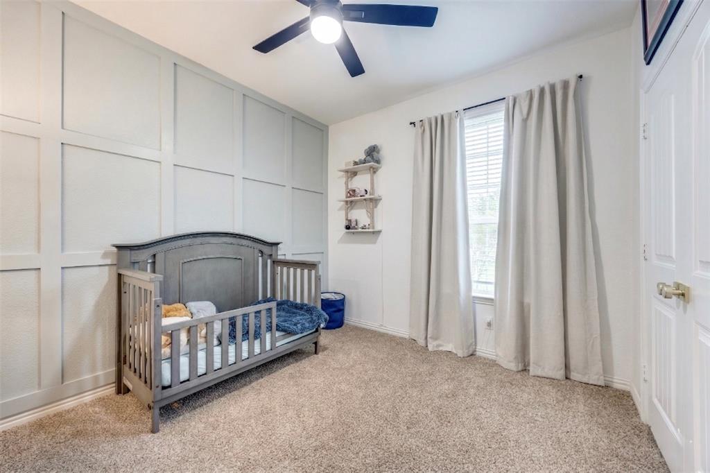 1933 Franklin Road Tom Bean, TX 75090 - Photo 21 of 28 a bedroom with furniture and a window