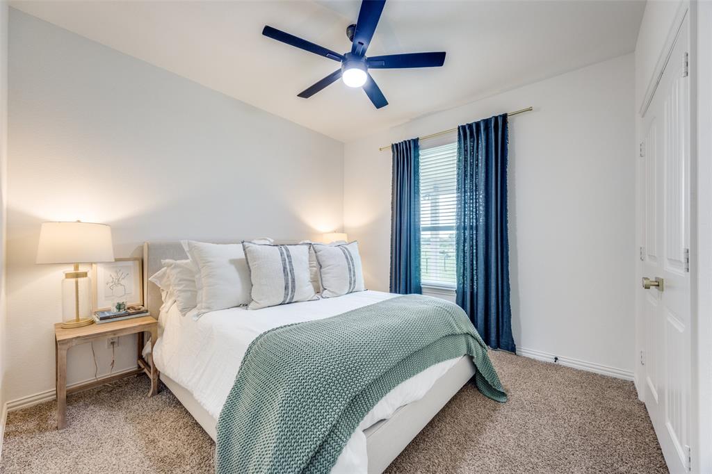 1933 Franklin Road Tom Bean, TX 75090 - Photo 22 of 28 a bedroom with a bed and a window