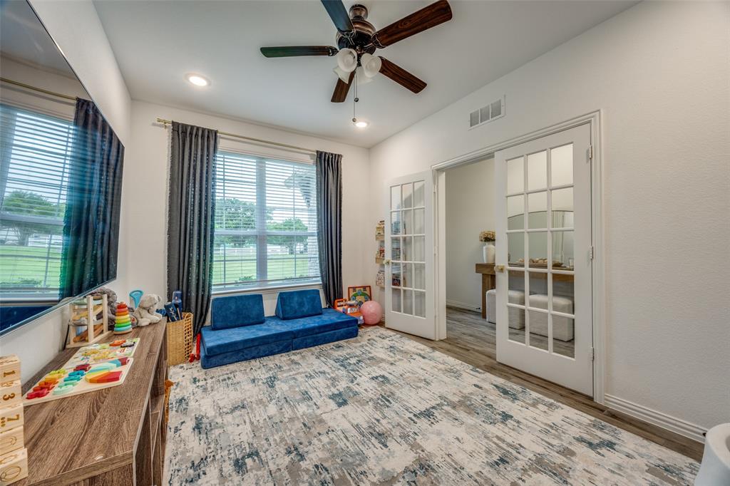1933 Franklin Road Tom Bean, TX 75090 - Photo 9 of 28 a bedroom with furniture and a window