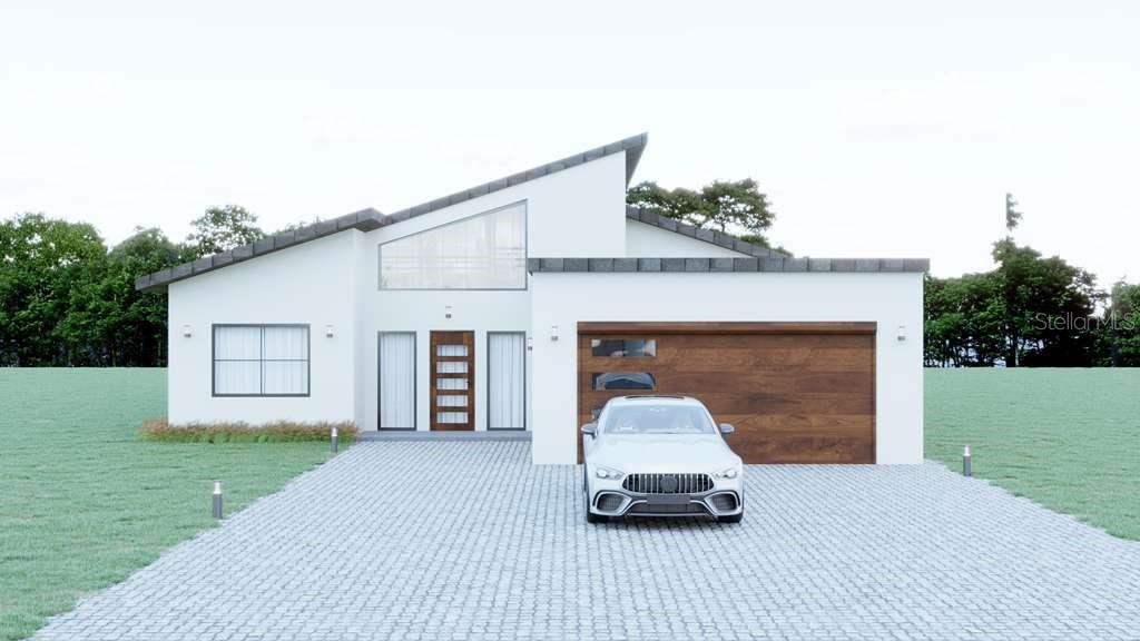 a car parked in front of house with a yard